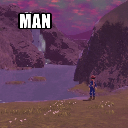 a man stands in front of a waterfall in a video game