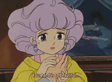 a cartoon of a girl with pink hair saying your hand is so beautiful