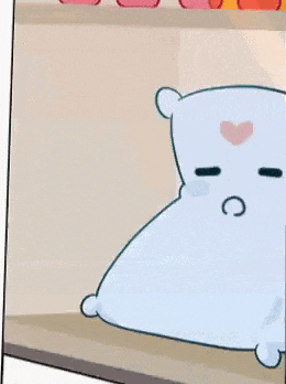 a cartoon bear is sleeping on a shelf with a heart on its face