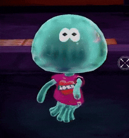 a blue jellyfish is wearing a pink shirt that says " love "