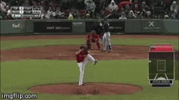a baseball game is being played on a field that is sponsored by fedex and verizon