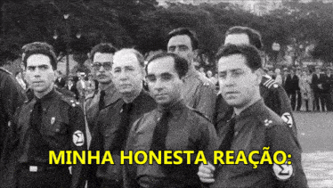 a black and white photo of a group of men with the words minha honesta reacao written above them