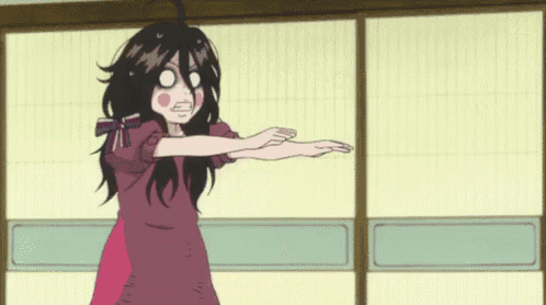 a girl in a pink dress is standing in front of a door