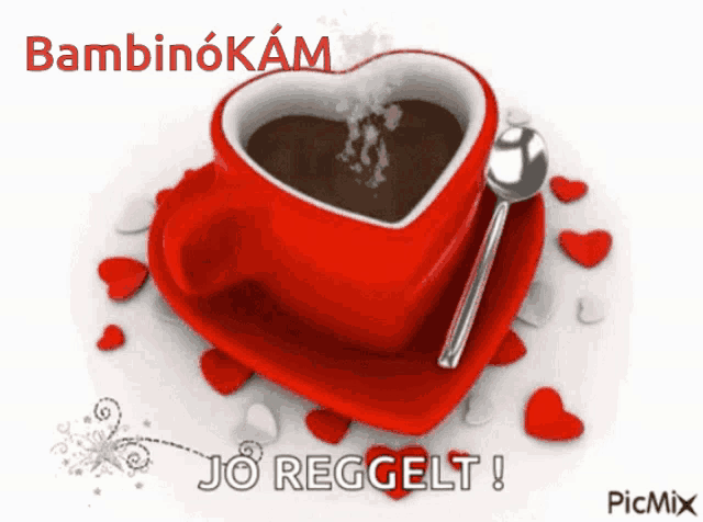 a picture of a heart shaped cup of coffee with a spoon on a saucer