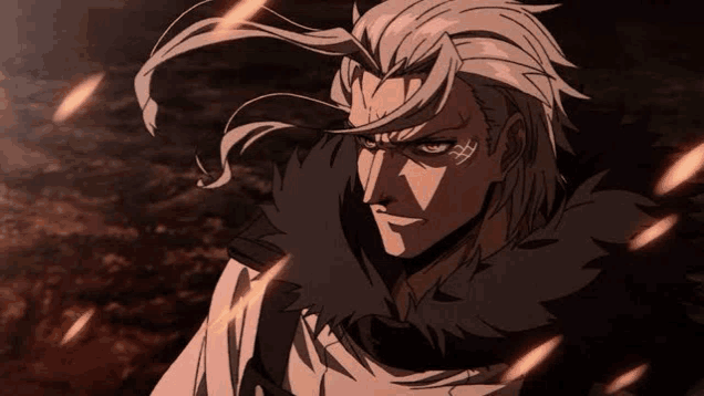 a man with long hair and a scar on his face is standing in a dark room with fire flying around him .