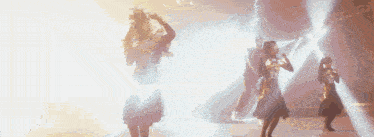 a group of people are dancing on a stage in front of a lightning strike .