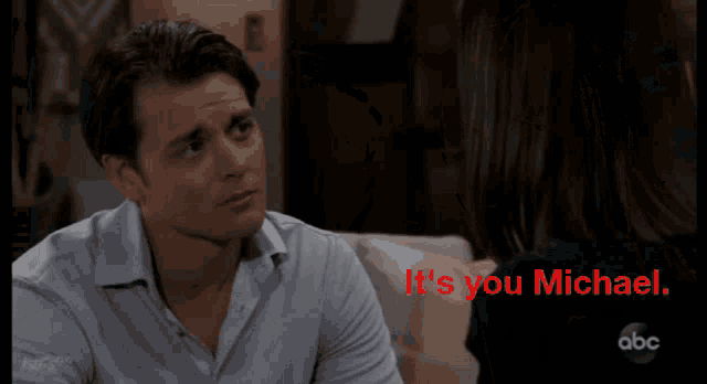 a man talking to a woman with the words " you 're the one "