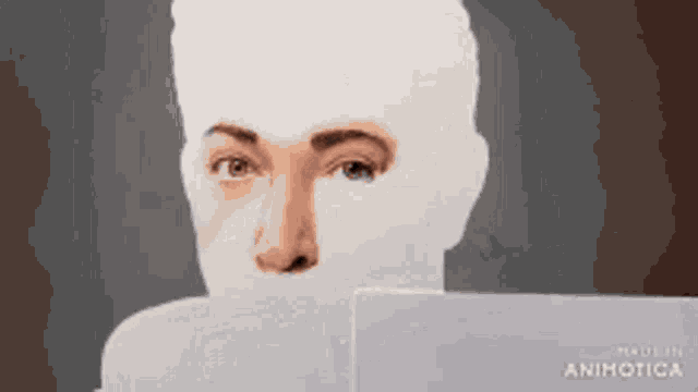 a drawing of a man 's face with a mask on it