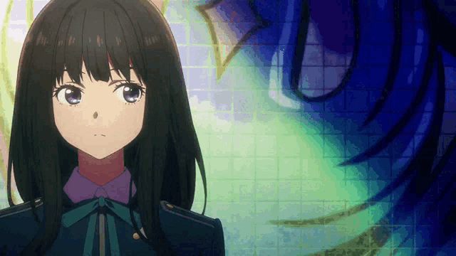 a girl with long black hair and a purple shirt