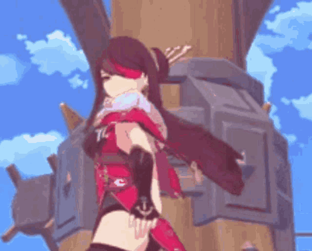 a girl in a red and black outfit is standing in front of a tower .