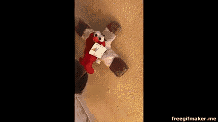 a teddy bear is surrounded by flames in a gif