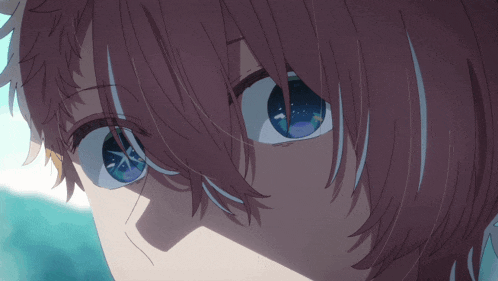a close up of a person 's eye with a blue pupil