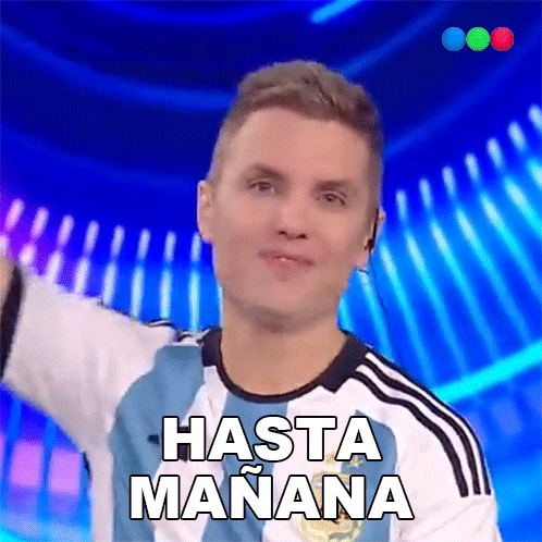 a man is wearing a shirt that says hasta manana on it