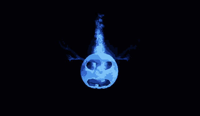 a pumpkin with a face on it and a blue fire coming out of it