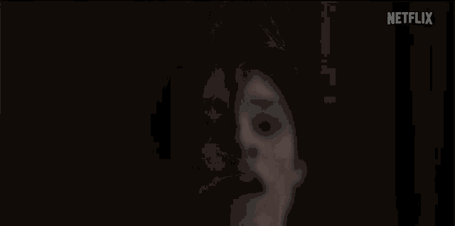 a close up of a man 's face with netflix written on the bottom right