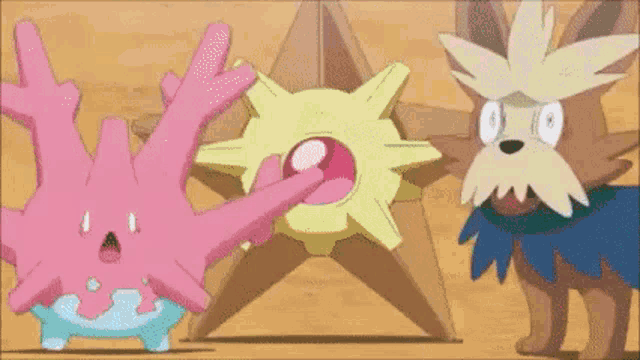 three cartoon characters are standing next to each other on a sandy surface .