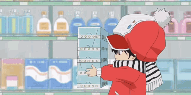 a person in a red hoodie is holding a stack of boxes in front of a shelf of bottles