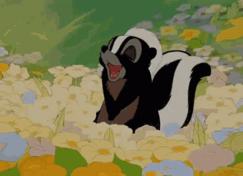 a cartoon skunk is standing in a field of flowers