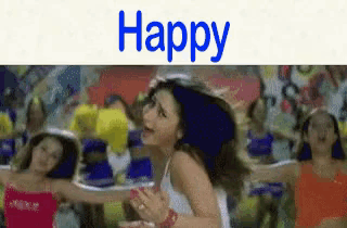 a woman is dancing in front of a crowd and the word happy is above her .