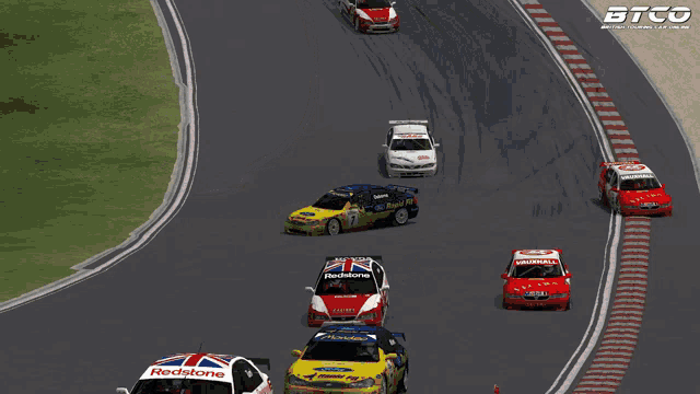 a group of racing cars on a track with btco on the bottom right