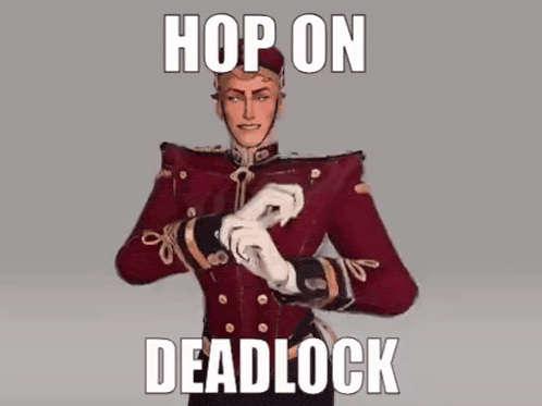 a man in a red suit and white gloves is making a funny gesture .
