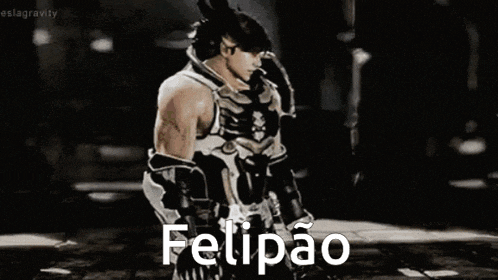 a man is standing in a dark room with the word felipao written on the bottom .