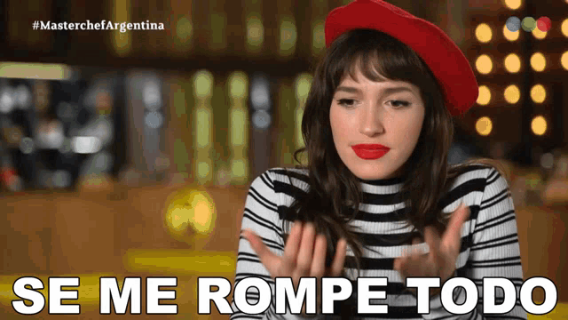 a woman wearing a red beret says " se me rompe todo "