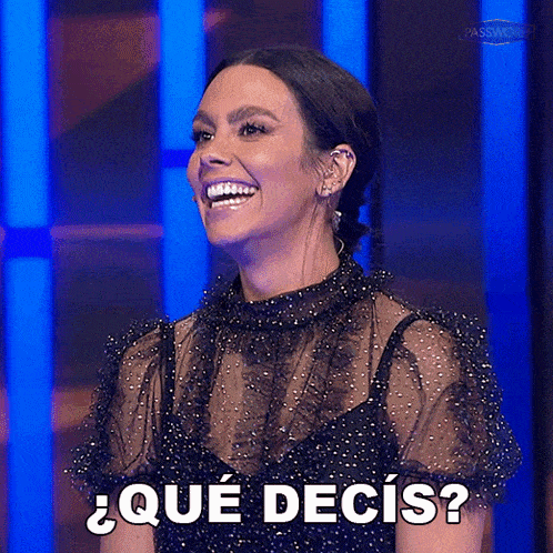 a woman in a black dress is smiling and says " que decisi "