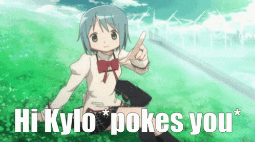 a girl in a school uniform is sitting in the grass and giving a thumbs up ..