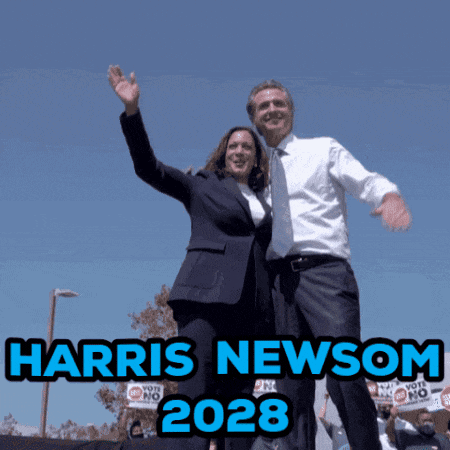 a man and a woman are waving in front of a sign that says harris newsom