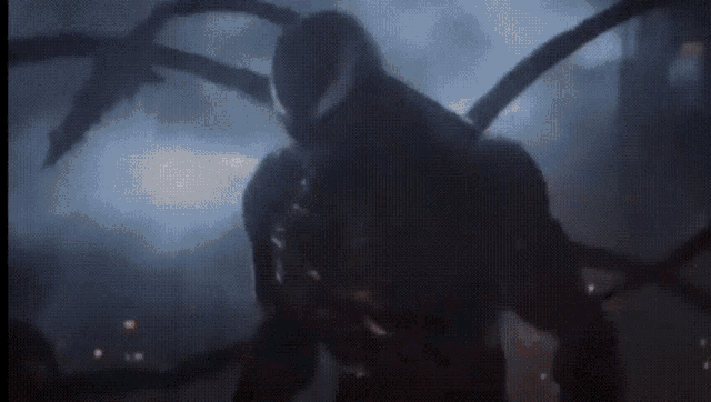 a picture of venom with the words let there be carnage