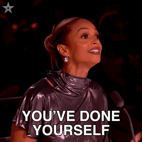 a woman sitting in front of a microphone with the words proud tonight written on the bottom
