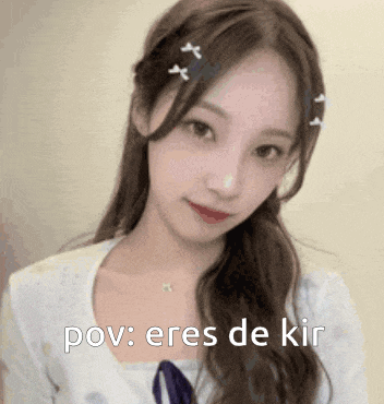 a close up of a woman 's face with the words pov : eres de kir on it .