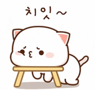 a cartoon cat is sitting on a small wooden stool with korean writing on it .