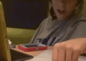 a girl wearing a t-shirt that says ' rcl ' on it