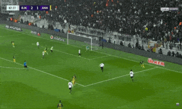 a soccer game between bjk and ank is underway