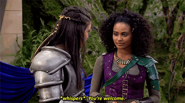 two women in armor are talking to each other and one of them is saying " whispers you 're welcome "