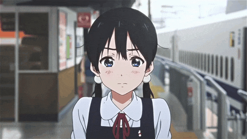 a girl with pigtails is standing next to a train