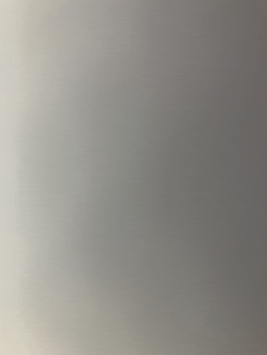 a close up of a gray background with a gradient