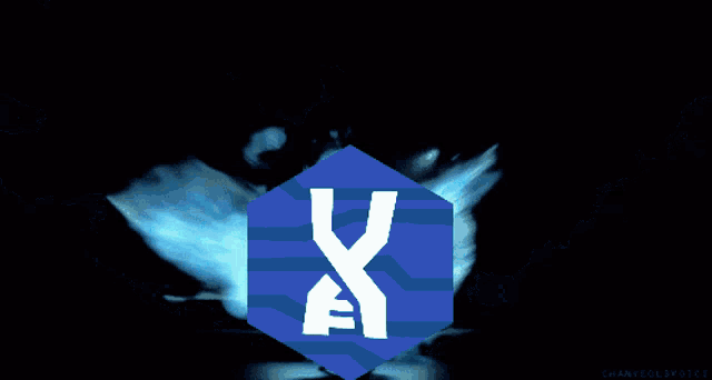 a blue cube with a white letter x inside of it
