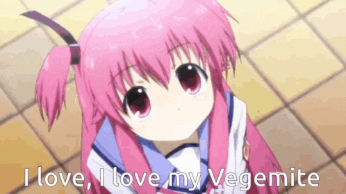 a girl with pink hair says i love my vegemite