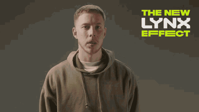 a man making a face in front of a sign that says " the new lynx effect "