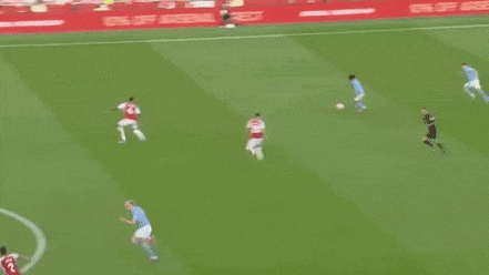 a soccer game is being played on a soccer field .