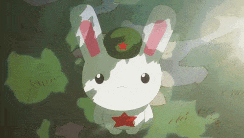a cartoon rabbit with a green hat and a red star on it