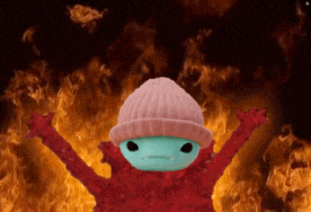 a cartoon character wearing a pink hat is standing in front of flames