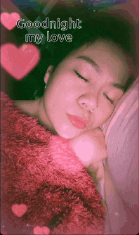 a woman is sleeping with her eyes closed and the words goodnight my love are above her
