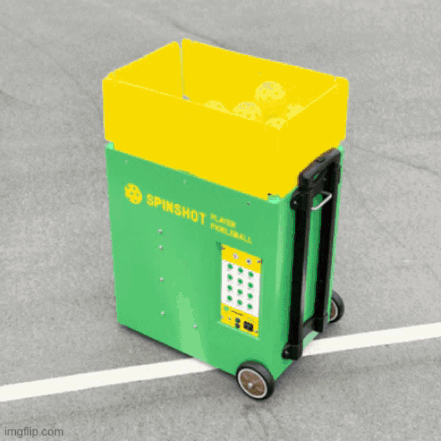 a green cover for a spinshot tennis machine
