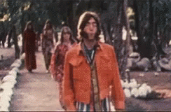 John Lennon Walking GIF - John Lennon Walking Hippie GIFs