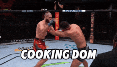 two men are fighting in a boxing ring with the words cooking dom written on the bottom