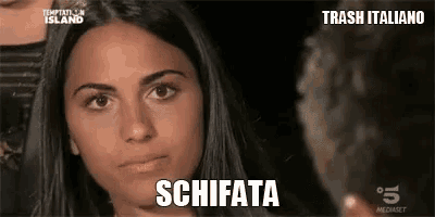 a close up of a woman 's face with the word schifata written on it .